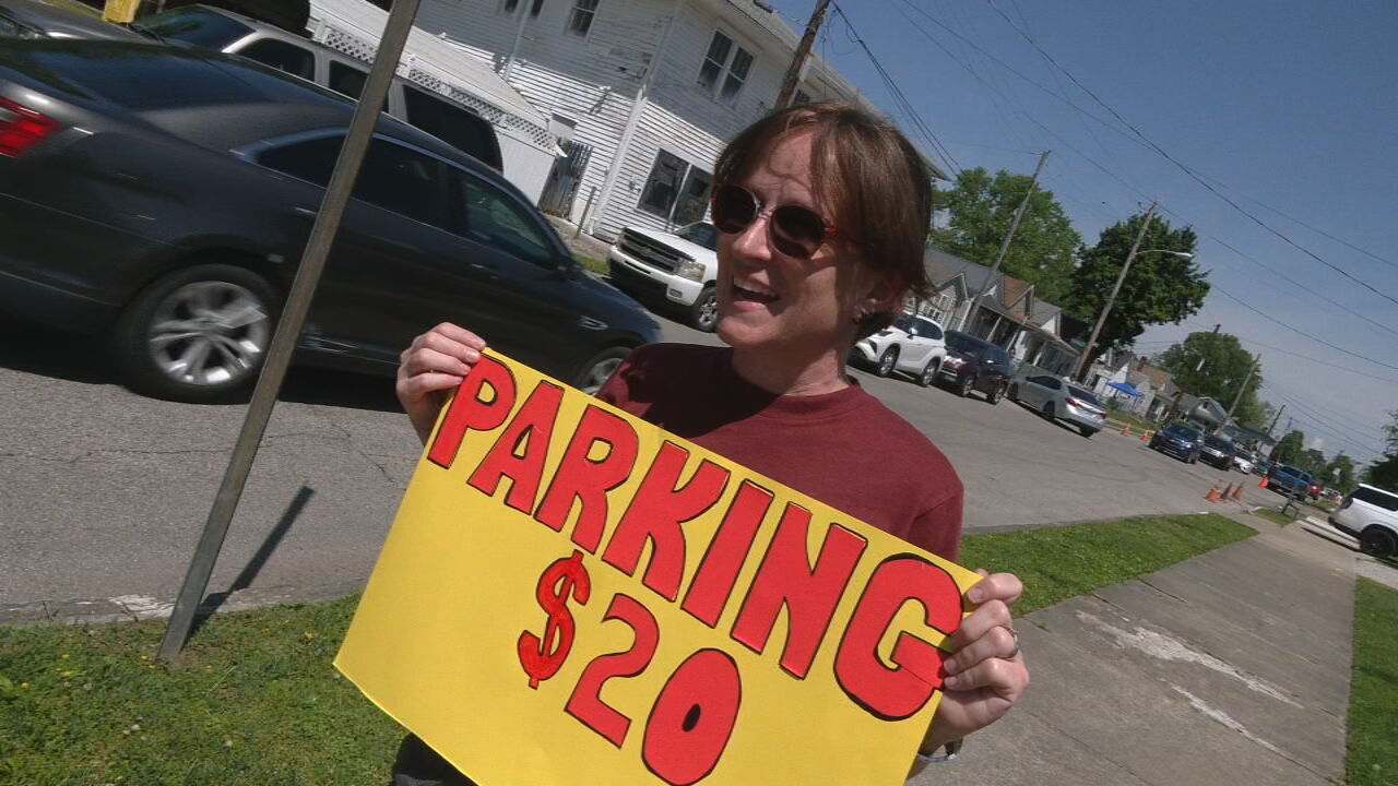 Amy Esterman charged cars $20 Wednesday to park in her yard near Churchill Downs